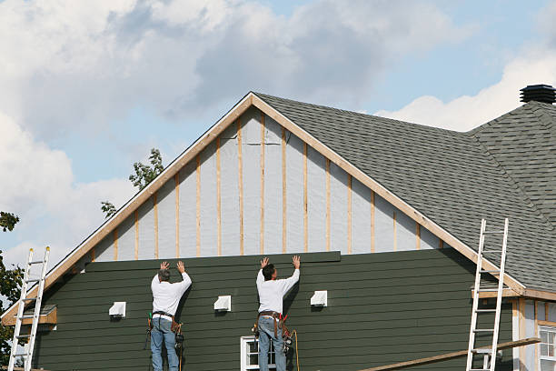 Professional Siding Installation technician working in Martins Ferry, OH